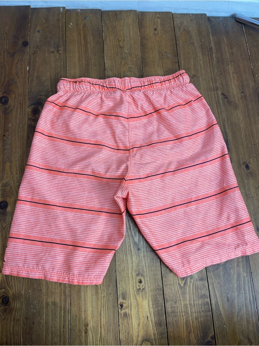 Hurley boys swim trunks size 10/12 orange stripes